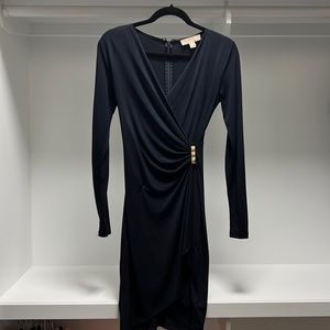 Micheal Kors long sleeve dress. Super flattering hugs all the right places.